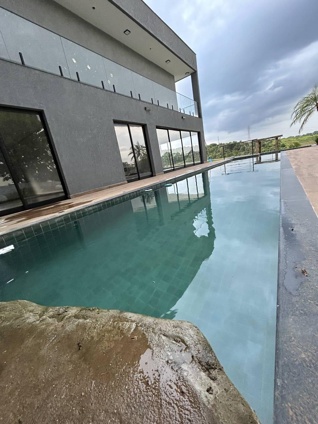 CASA COM 4 SUÍTES NO CONDOMÍNIO RESERVA ALTOS DO CATAGUÁ EM TAUBATÉ