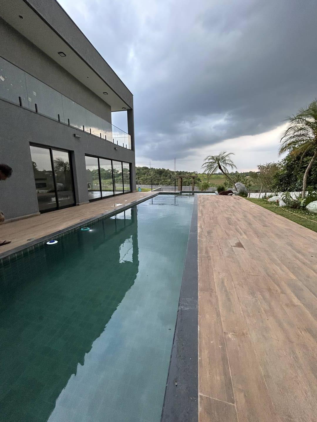 CASA COM 4 SUÍTES NO CONDOMÍNIO RESERVA ALTOS DO CATAGUÁ EM TAUBATÉ